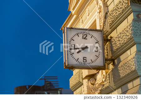 Clock on historic building in St. Petersburg captures evening light and reflects local architecture Clock on historic building in St. Petersburg captures evening light and reflects local architecture 132340926
