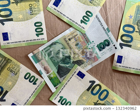Bulgarian lev and euro banknotes side by side, symbolizing upcoming currency transition in Bulgaria. Concept of Bulgaria joining eurozone and adopting euro in 2026 Bulgarian lev and euro banknotes side by side, symbolizing upcoming currency transition in Bulgaria. Concept of Bulgaria joining eurozone and adopting euro in 2026 132340962