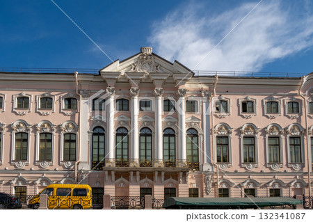 Beautiful architectural details of a historic building in Saint Petersburg under a bright blue sky during the day 132341087
