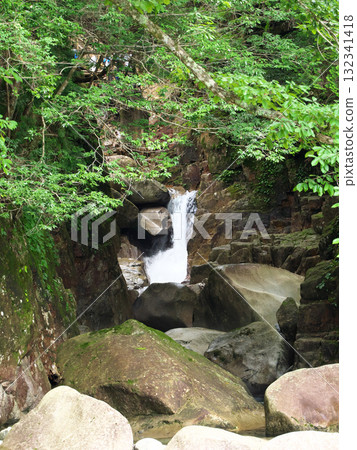 Landscape with a waterfall deep in the forest 132341418
