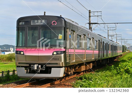 Nagoya Municipal Transportation Bureau 7000 series 7002 train running on the Meitetsu Komaki Line Nagoya Municipal Transportation Bureau 7000 series 7002 train running on the Meitetsu Komaki Line 132342360