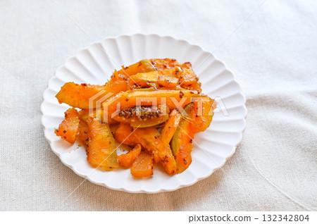 Stir-fried pumpkin with mustard and sugar and soy sauce Stir-fried pumpkin with mustard and sugar and soy sauce 132342804
