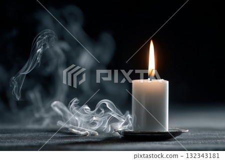 Single candle burning in darkness, symbolizing isolation and exclusion with soft smoke trails 132343181