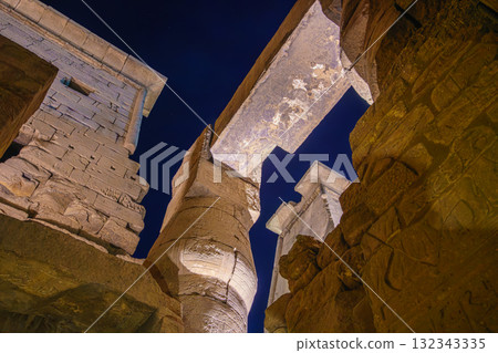 Dramatic Low Angle View of Luxor Temple Megaliths and Lintel at Night. 132343335