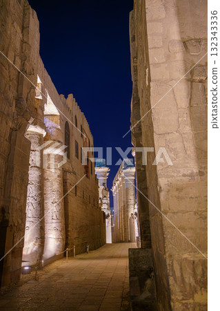 Illuminated Colonnade Pathway at Luxor Temple Egypt at Night. 132343336