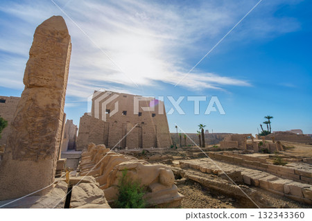 Obelisk and ram headed sphinxes at Karnak Temple Complex Luxor Egypt. Obelisk and ram headed sphinxes at Karnak Temple Complex Luxor Egypt. 132343360