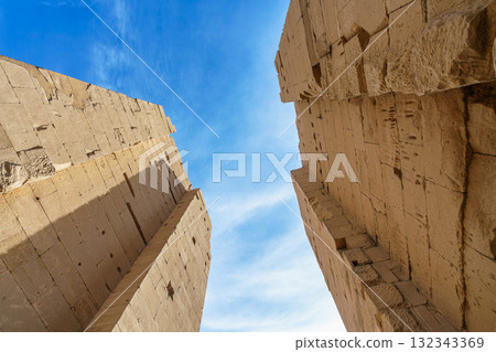 Temple of Karnak towers against blue sky in Luxor Egypt. 132343369