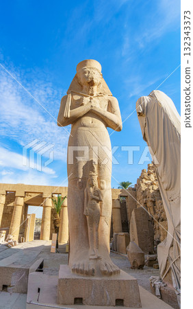 Colossal Ramesses II statue with Queen Nefertari at Karnak Temple Luxor Egypt. 132343373