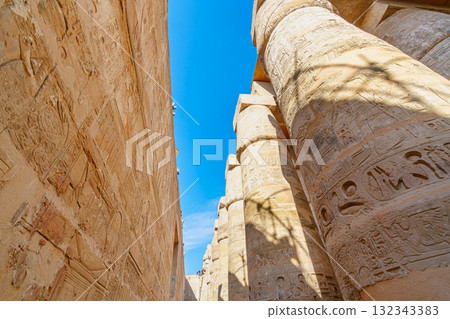 Hieroglyphic Columns with Sunlight at Great Hypostyle Hall Karnak Luxor Hieroglyphic Columns with Sunlight at Great Hypostyle Hall Karnak Luxor 132343383