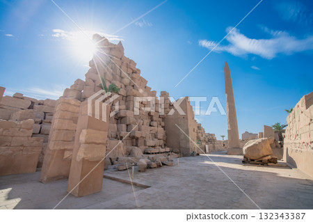 Obelisk and ruins in Temple of Karnak Luxor Egypt under bright sun. Obelisk and ruins in Temple of Karnak Luxor Egypt under bright sun. 132343387