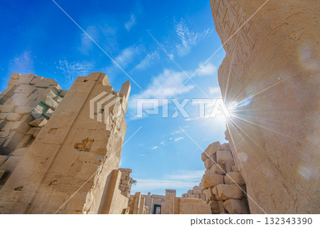 Sunburst Over Ancient Ruins at Temple of Karnak in Luxor Egypt. 132343390