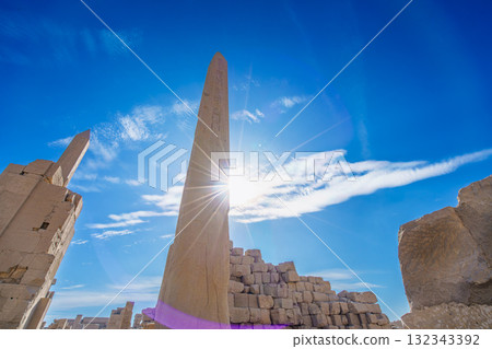 Obelisk and Sunlight at Temple of Karnak Luxor Egypt Ancient Sacred Symbol. Obelisk and Sunlight at Temple of Karnak Luxor Egypt Ancient Sacred Symbol. 132343392
