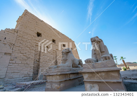 Ram-Headed Sphinx Statues at Temple of Karnak Entrance in Luxor Egypt. Ram-Headed Sphinx Statues at Temple of Karnak Entrance in Luxor Egypt. 132343401