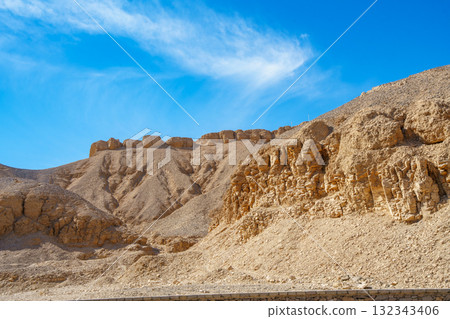 Valley of the Kings Arid Mountain Desert Landscape Luxor Egypt Blue Sky. 132343406