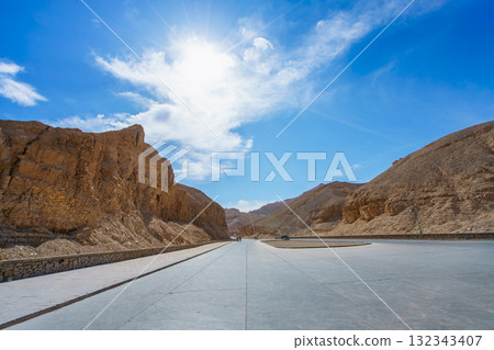 Paved Road through Rocky Desert Hills at Valley of the Kings Luxor Egypt. 132343407
