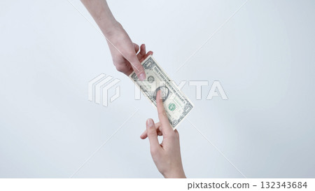 Hands exchanging one dollar bill on white background 132343684
