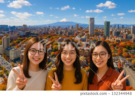 Autumn leaves overlooking the cityscape towards Mount Fuji from New Man Takanawa 132344948