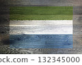 Sierra Leone flag on rustic old wood surface background 132345000