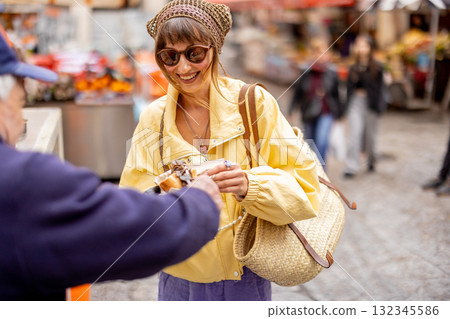Woman Buying Pani ca Meusa in Palermo Woman Buying Pani ca Meusa in Palermo 132345586
