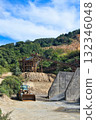A mechanical quarry in the mountains 132346048