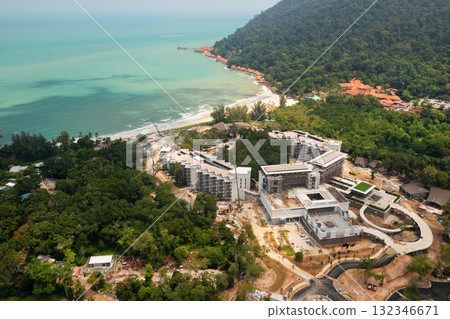 The construction of a coastal resort on Langkawi Island next to a beautiful beach continues. Malaysia The construction of a coastal resort on Langkawi Island next to a beautiful beach continues. Malaysia 132346671