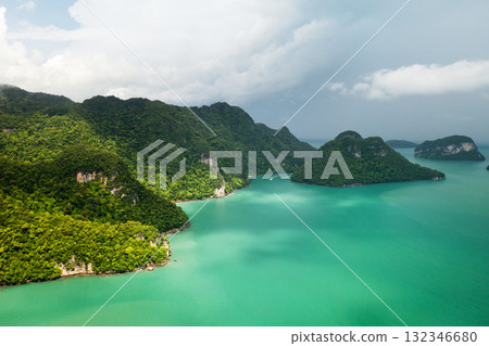 Stunning aerial view of emerald waters and lush islands in a tropical paradise at KILIM Geopark on Langkawi Island. Malaysia 132346680