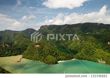 Top view of the lake in Dayang Bunting Marble Geoforest Park. Kilim Geopark on Langkawi Island. Malaysia Top view of the lake in Dayang Bunting Marble Geoforest Park. Kilim Geopark on Langkawi Island. Malaysia 132346681