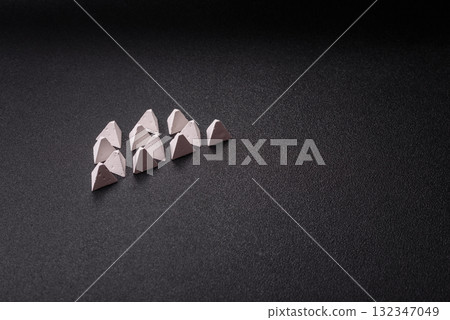 Anti-tank barrier or dragon's teeth made of concrete and iron as a fortification. Dragon's teeth 132347049