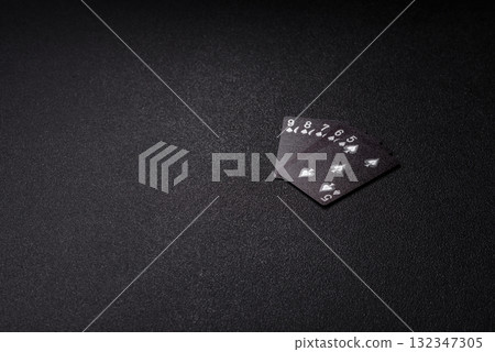 Playing card game poker in casino with chips, bets and risk. Cards and chips Playing card game poker in casino with chips, bets and risk. Cards and chips 132347305