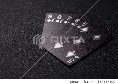 Playing card game poker in casino with chips, bets and risk. Cards and chips 132347309