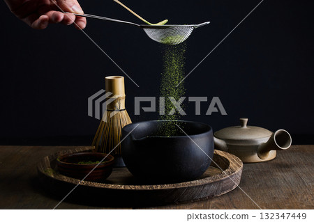 Matcha Preparation Scene. A serene setup of traditional matcha tea preparation 132347449