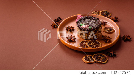 Sweet tart, pie with chocolate and cream with fruit filling on a plate. Chocolate tart 132347575