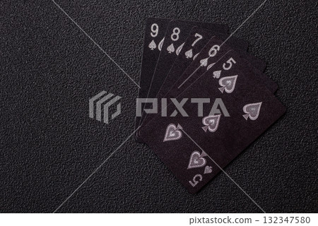 Playing card game poker in casino with chips, bets and risk. Cards and chips Playing card game poker in casino with chips, bets and risk. Cards and chips 132347580