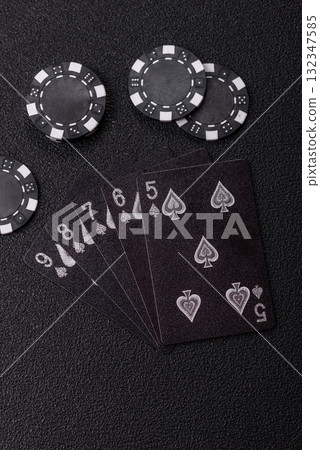 Playing card game poker in casino with chips, bets and risk. Cards and chips 132347585