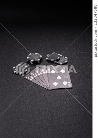 Playing card game poker in casino with chips, bets and risk. Cards and chips 132347590