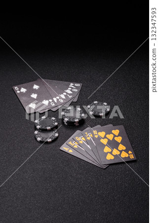 Playing card game poker in casino with chips, bets and risk. Cards and chips 132347593