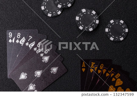 Playing card game poker in casino with chips, bets and risk. Cards and chips 132347599