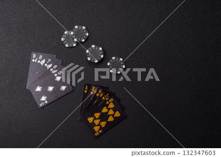 Playing card game poker in casino with chips, bets and risk. Cards and chips Playing card game poker in casino with chips, bets and risk. Cards and chips 132347603