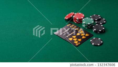 Playing card game poker in casino with chips, bets and risk. Cards and chips 132347606