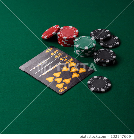 Playing card game poker in casino with chips, bets and risk. Cards and chips Playing card game poker in casino with chips, bets and risk. Cards and chips 132347609