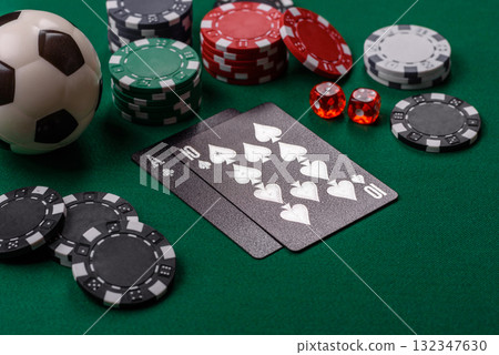 Playing blackjack or baccarat card game in casino with chips, bets and risk. Cards and chips 132347630