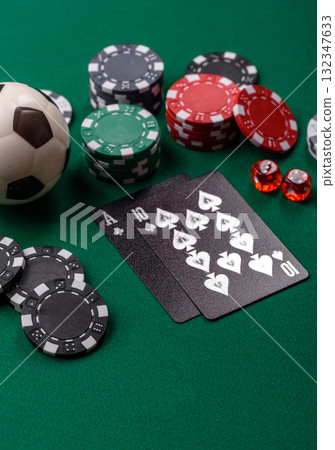Playing blackjack or baccarat card game in casino with chips, bets and risk. Cards and chips Playing blackjack or baccarat card game in casino with chips, bets and risk. Cards and chips 132347633