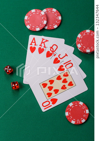Playing card game poker in casino with chips, bets and risk. Cards and chips Playing card game poker in casino with chips, bets and risk. Cards and chips 132347644