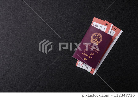 China, Chinese passport with money and flight tickets. Chinese passport with tickets China, Chinese passport with money and flight tickets. Chinese passport with tickets 132347730