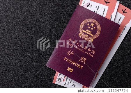 China, Chinese passport with money and flight tickets. Chinese passport with tickets China, Chinese passport with money and flight tickets. Chinese passport with tickets 132347734