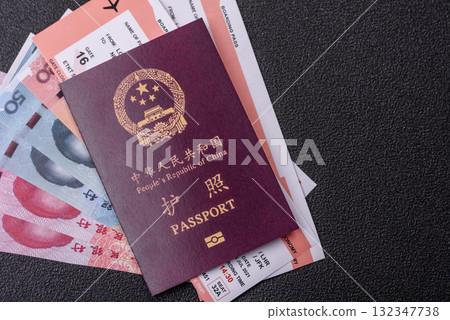 China, Chinese passport with money and flight tickets. Chinese passport with tickets China, Chinese passport with money and flight tickets. Chinese passport with tickets 132347738
