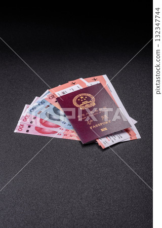 China, Chinese passport with money and flight tickets. Chinese passport with tickets China, Chinese passport with money and flight tickets. Chinese passport with tickets 132347744