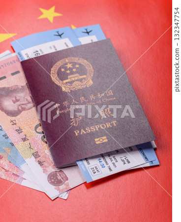 China, Chinese passport with money and flight tickets. Chinese passport with tickets China, Chinese passport with money and flight tickets. Chinese passport with tickets 132347754