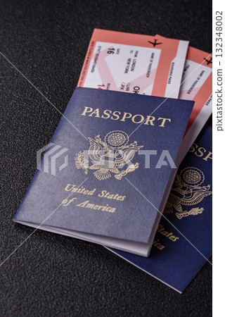 US passport or id document with tickets for flight, travel, border crossing. US passport and tickets 132348002