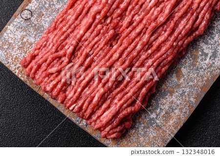 Raw minced beef or pork, ground meat for burgers. Raw minced meat Raw minced beef or pork, ground meat for burgers. Raw minced meat 132348016